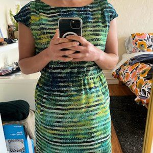 Short green satin dress